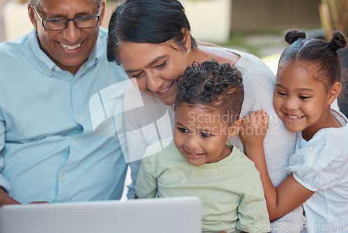 Image of Video call, laptop and children bonding with grandparents, happy and talking online in their home. Babysitting, kids and online entertainment with mature couple enjoying time with their grandkids