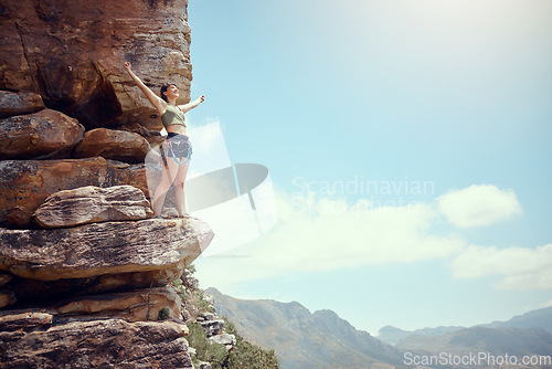 Image of Mountains, success and hiking woman with view of nature environment, countryside landscape or blue sky background. Happy, exercise power or fitness freedom in sports workout or Colorado rock climbing