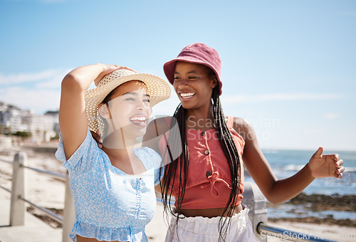 Image of Happy women, friends and summer relax at promenade sea, beach and ocean for fresh air, freedom and fun in Miami Florida. Smile, travel and vacation young people excited for sunshine holiday together