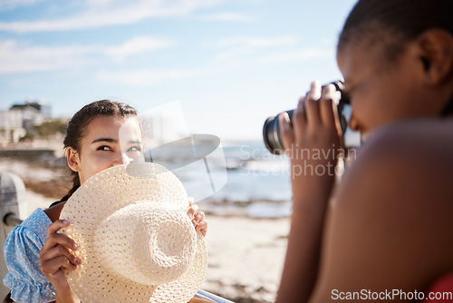 Image of Travel influencer, women and photographer on beach for Miami, Florida social media review in content creator vlog. Play, bond and fun fashion friends by ocean sea background in photography photoshoot