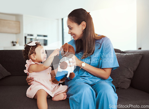 Image of Pediatrician doctor consulting kid, teddy bear and happy healthcare checkup at home visit. Happy baby girl, occupational therapy and woman nurse therapist play in lounge for children wellness service