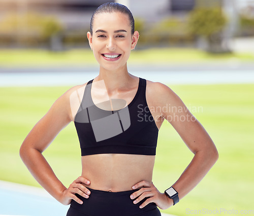 Image of Sports track, portrait and fitness woman, athlete and runner ready for competition training, exercise and cardio workout with motivation. Happy, smile and healthy strong person running marathon field