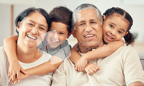 Image of Grandkids hug grandparents for love, care and relax in family home together. Portrait of happy children, smile senior grandma and laughing elderly grandpa bond and funny play together in quality time