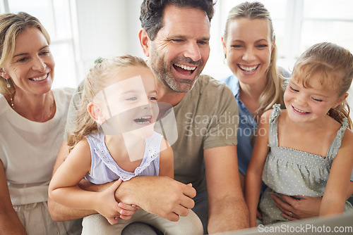 Image of Happy, family and watching tv with kids together in home and watching or streaming a comedy movie. Father, mother and parents who love entertainment technology relax, laugh and have fun in a house.