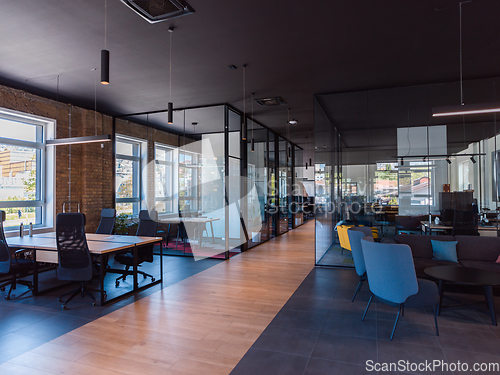 Image of In a setting of modern, glass-walled business startup offices, the open, airy workspace reflects a contemporary and innovative ambiance, promising a dynamic environment for entrepreneurial growth