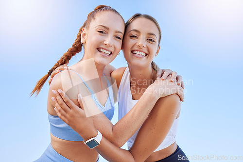 Image of Sports, fitness friends or woman hug for support, motivation and teamwork on outdoor blue sky mock up sunshine lens flare. Happy young athlete people workout training together for a healthy lifestyle