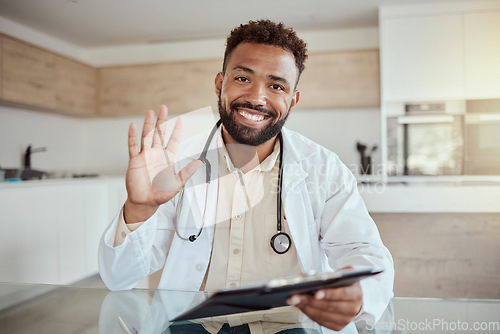 Image of Doctor, video call and consultant in telehealth of a black man in healthcare, diagnosis or medical advice. Portrait of a African male health expert in online consultation for checkup or appointment