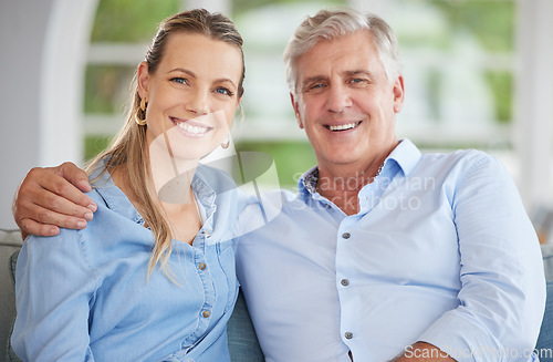 Image of Love, family and portrait of father and daughter relax on a sofa, bonding and sitting in a living room together. Happy, smile and hugging parent and woman enjoying quality time on the weekend at home