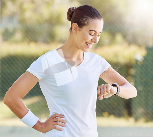 Image of Woman with watch relax after exercise, fitness or sports training for cardio, health and body wellness. Young girl, athlete or marathon runner with stopwatch pause to check workout running time time