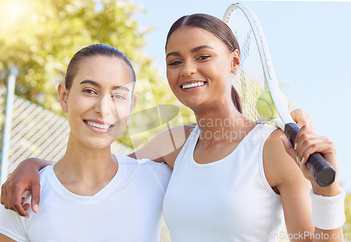 Image of Tennis, women and couple portrait with lens flare sunshine on blue sky. Fitness athlete or professional sports player training together for summer competition with trust, love and female empowerment