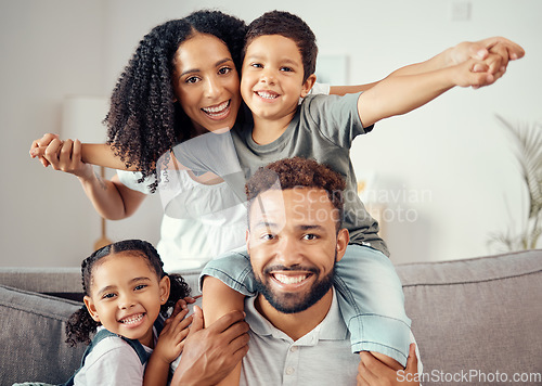 Image of Mother, father and children in family portrait and bonding in house, home or hotel living room. Smile, happy and fun girl, boy or kids playing airplane game with man, mexican woman or parents on sofa