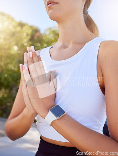 Image of Meditation, yoga and prayer hands of woman with outdoor summer lens flare for wellness, spiritual lifestyle. Young, fitness girl with calm mindset praying and meditate for faith, self care and health