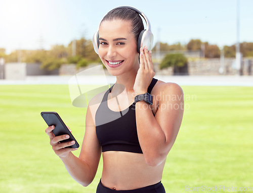 Image of Woman fitness runner listening to music, 5g phone for motivation, wellness or training outdoor sport or event. Girl sports athlete workout, running and podcast or radio exercise for cardio at stadium