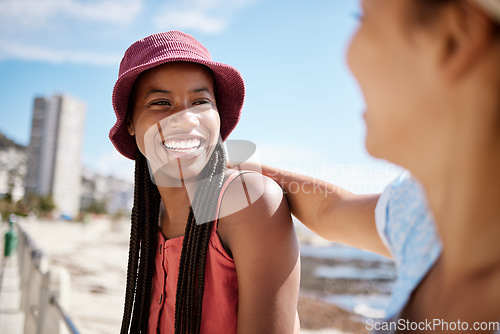 Image of Black woman, summer and bonding with friends by beach, ocean and sea in Miami, Florida. Smile, happy or relax fashion tourist, students or people laughing in city travel location for holiday vacation