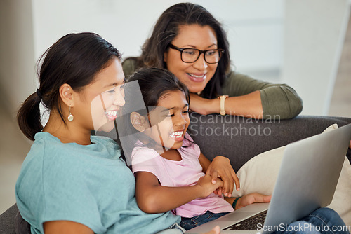 Image of Family, children and laptop with a girl, mother and grandmother streaming an online subscription service in the house. Love, computer and visit with a senior woman, daughter and granddaughter at home