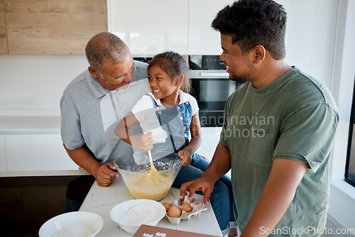 Image of Family, love and cooking with a girl, father and grandfather baking together in the kitchen of their home. Food, learning and teaching with a daughter, dad and grandad preparing a meal in a house