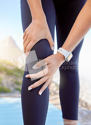 Image of Knee pain, fitness or sport woman with muscle or leg injury for exercise, workout or running training in Cape Town. Runner, wellness and athlete with medical emergency or knee joint in health sports