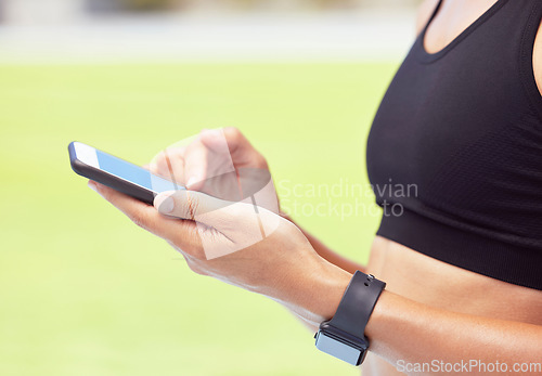 Image of Fitness woman, phone app and hands of sports outside for exercise, training and workout for health and fitness. Closeup of active female athlete runner tracking progress for cardio steps and wellness