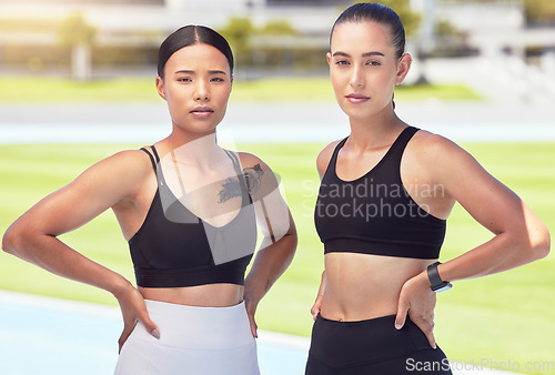 Image of Fitness, workout and exercise friends outdoor on a sports track, stadium or arena with healthy body. Women with motivation and focus after cardio training and looking strong, wellness and slim