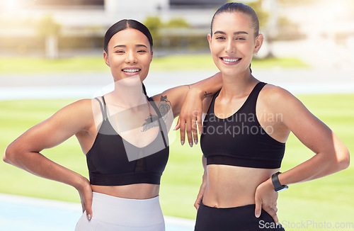 Image of Athlete fitness, workout and exercise friends outdoor on a sports track, stadium or arena with healthy body. Women with smile and happy after cardio training and looking strong, wellness and slim