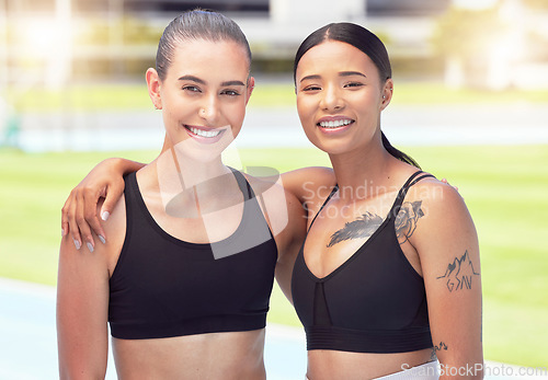 Image of Sports, fitness and portrait of happy athletes doing outdoor cardio training exercise at a field. Women friends with a wellness, workout and wellness lifestyle exercising outside on a running track.