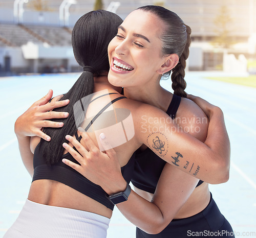 Image of Friends hug and smile for congratulations, running or exercising outdoors on racetrack. Woman, support and winner, happy during summer workout for motivation and success, run for fitness and health