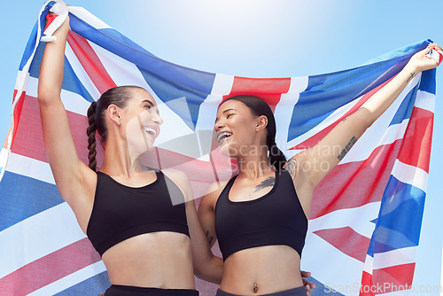 Image of Women, runner and England, running in sport event or international competition. Smile, happy and healthy girl teamwork with flag of the UK at sport tournament or global contest show diversity