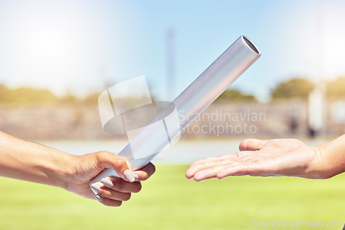 Image of Teamwork, sports and hands of runner with relay race with baton in field stadium event for health, training or fitness. Partnership, goal and support with athlete running in exercise or competition