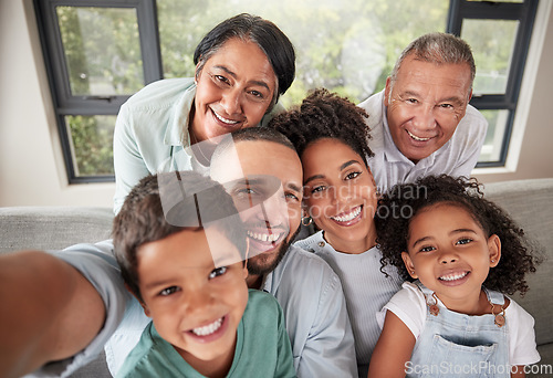 Image of Selfie, family and children with kids, parents and grandparents taking a photograph at a visit in their home. Face, happy and smile with a grandmother, grandfather and relatives posing for a picture