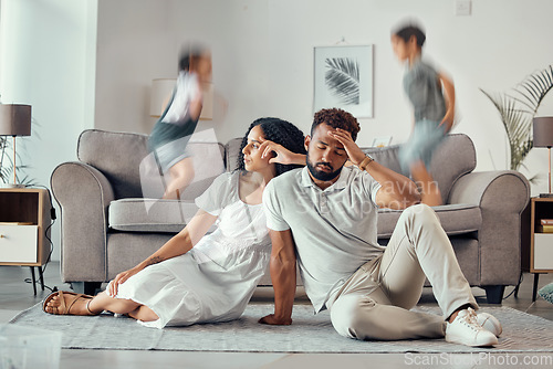 Image of Stress, tired and parents with adhd kids playing on couch making mom sad, exhausted and frustrated with dad. Headache, mother and overwhelmed father with loud children jumping on sofa in family home
