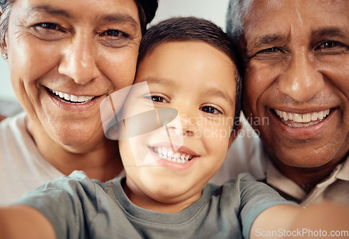 Image of Boy take selfie with happy grandparents, together in closeup or zoom portrait in house. Latino male child smile with grandma and grandpa in macro with expression of happiness and love in family home