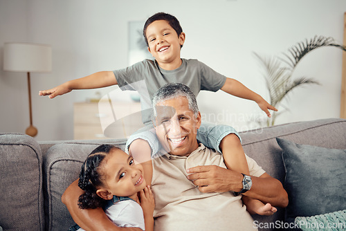 Image of Grandkids, grandpa and play together in living room for love, care and relax in family home. Portrait of happy children, smile senior grandparent and bonding, laughing and enjoying funny quality time