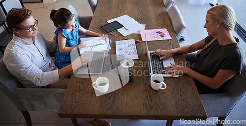 Image of Parents and daughter being productive with remote work and homework, multitasking at table in their home. Startup, business owner and child doing online task in a busy house with little girl drawing