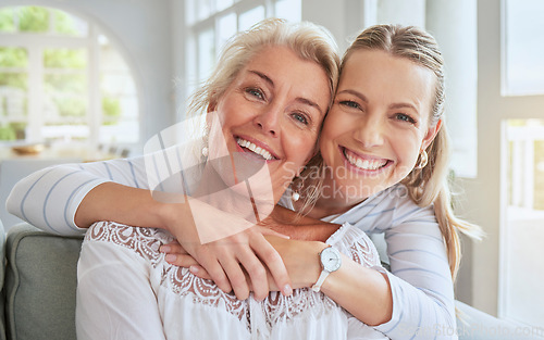 Image of Women, hug and family bond on mothers day in a house living room and home interior. People portrait, smile and happy woman with senior and retirement elderly in trust, love and support on lounge sofa