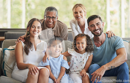 Image of Happy big family, portrait and smile on sofa in home living room, spending quality time and bonding. Love, support and care of grandparents, parents and girls together on house couch smiling or laugh