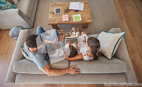 Image of Family video call, web communication and grandparents talking from vacation to children and speaking on laptop from above. Top view of parents and kids in discussion with people on pc on the sofa.