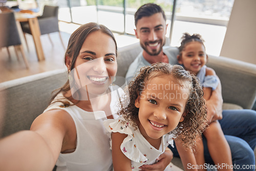 Image of Happy family, selfie and love on sofa in home living room couch, bonding and caring. Portrait, mom and father, kids or girls from Spain spending quality time in relax, care and support in house.