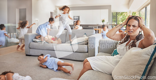 Image of Stress, headache and mother with adhd kids running, jumping and playing in family home or house living room. Mental health, burnout or anxiety for parent with autism, energy and hyper active children