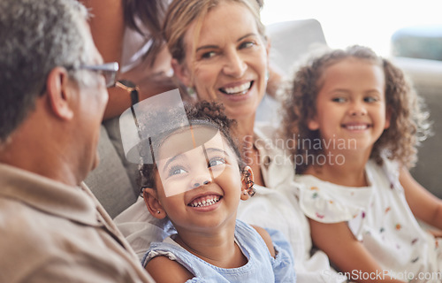 Image of Happy, smile and family relax on living room couch and talking, conversation and doing a catch up. Love, diverse grandparents and grandchildren bonding, fun and quality time in family home together.
