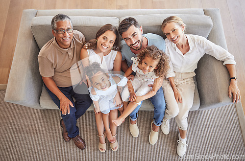 Image of Love, smile and diversity portrait of happy family relax on living room sofa and bonding during annual family reunion above view. Grandparents, parents and children enjoy fun quality time together