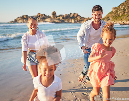 Image of Beach, summer and travel with family running on sand in Mexico for vacation fun with kids. Happy mother and father bond together chasing excited children on ocean holiday break in the sun.