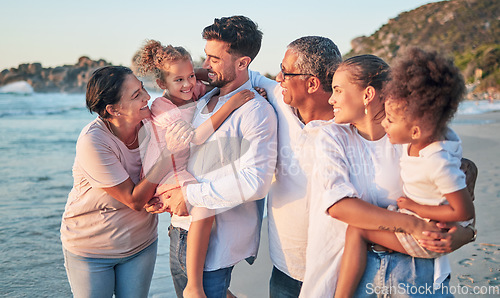 Image of Happy big family, love and beach holiday in Brazil, vacation or summer trip. Travel, relax and mom, dad and grandparents with girls smile walking, bonding and caring on ocean, sea and sandy shore.