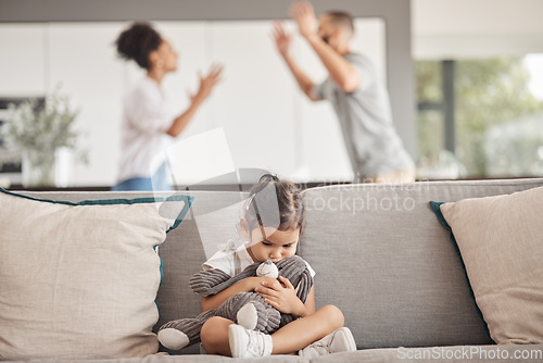 Image of Depression, stress or child trauma for girl with teddy bear on living room sofa and listening to fight, scream or shouting parents. Burnout, anxiety or mental health kid with divorce father or mother