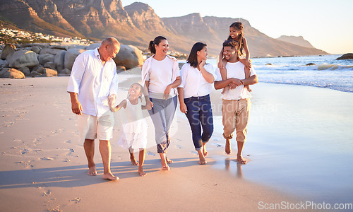 Image of Big family, children or girls bonding on beach on summer sunset holiday, social reunion or vacation. Smile, happy and walking parents, mom and dad with relax senior grandparents and kids in Cape Town