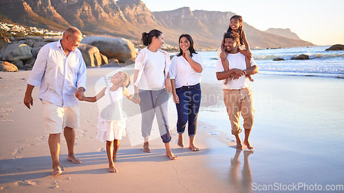 Image of Generation big family walking beach in summer vacation, travel and freedom in South Africa. Happy, smile and carefree grandparents, parents and kids relax, bond and enjoy funny sunny holiday together