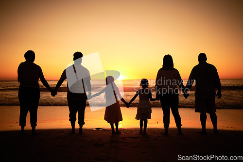 Image of Big family silhouette on beach with sea waves, sunset on the horizon and holding hands for development wellness, support and love. Children and group of people watch ocean on dark, orange sky mockup