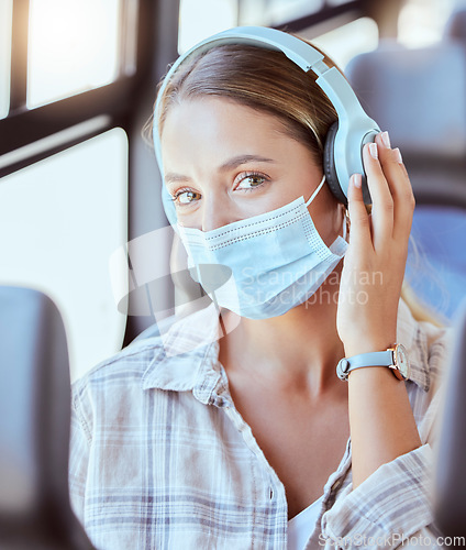 Image of Bus travel, covid woman and headphones for music, podcast or radio in urban journey, transport and trip. Portrait of young girl listening to audio, face mask rules and corona virus safety on train