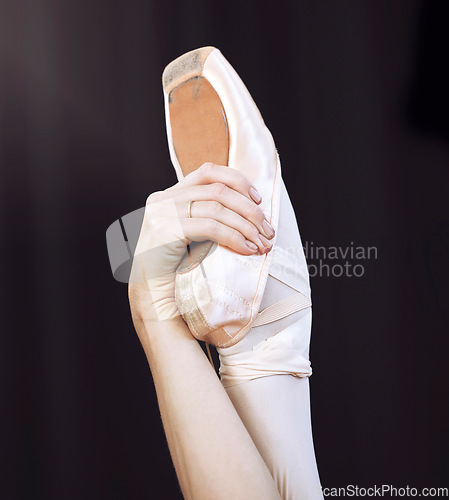 Image of Dancer hand and foot on ballet shoe and hand, show posture and balance at dance class. Zoom of woman dancing in studio, practice or training during professional performance or recital in a theater