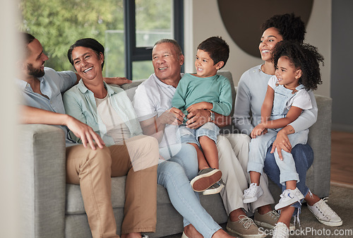 Image of Children, parents and happy grandparents on sofa, generations of family together in living room. Love, home and couple with kids, grandma and grandpa from Brazil relax and smile on couch in new home.