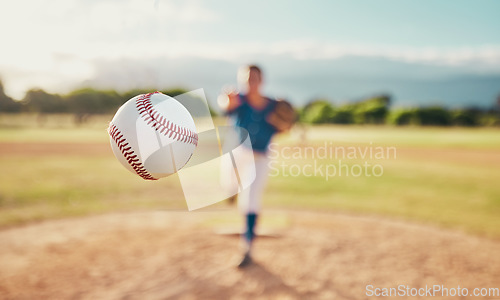 Image of Baseball, sport and ball with a sports athlete or pitcher throwing and pitching a ball during a game or match on a court. Fitness, workout and exercise with an athletic person training outside